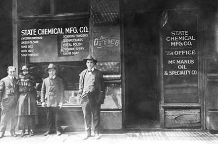 Jay Zucker and others in front of State Chemical building on East 2nd Street, 1920