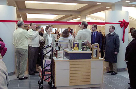 Cutting the ribbon during Grand Opening of renovated library, 2000